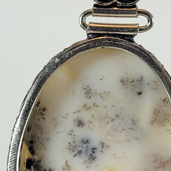 Handmade Silver Pendant With White Dendritic Opal & Floral Bail Detailing - Picture 6 of 10